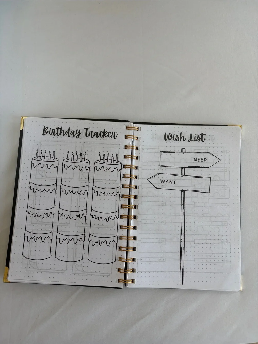 Bullet Journal Game Spiral Notebook in Black with Colored Pencils